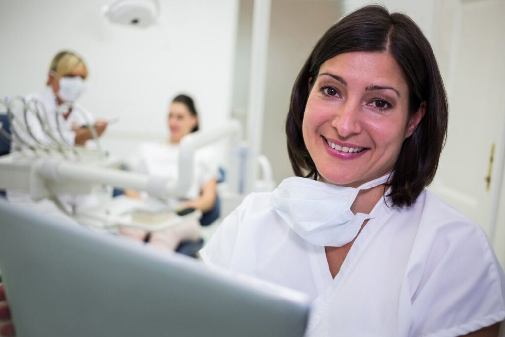 smiling-female-dentist-dental-clinic_107420-74193